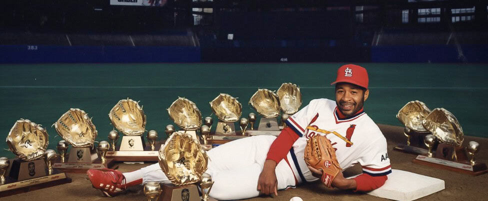 Ozzie Smith showcasing his incredible defensive skills on the field.